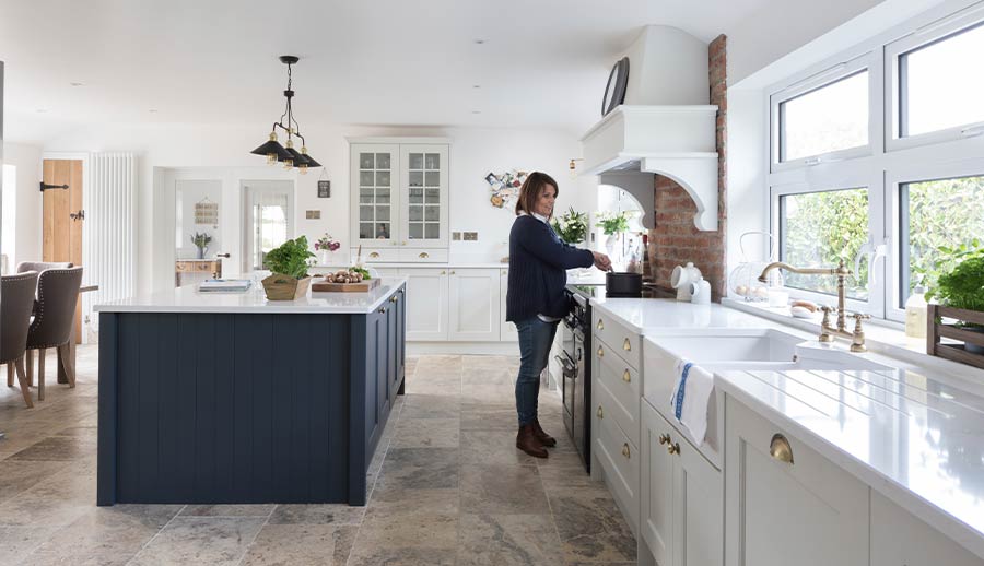 Blue classic kitchen featuring kitchen island