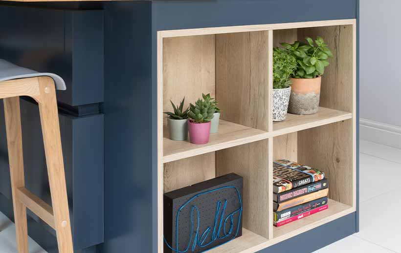 Open shelving in a modern blue kitchen