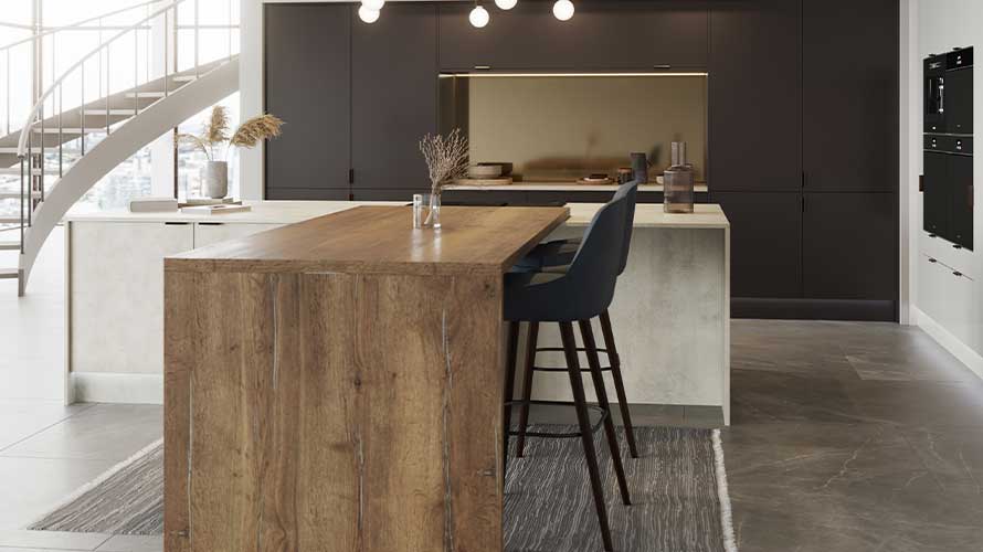 Dark kitchen in warm brown with metallic accents