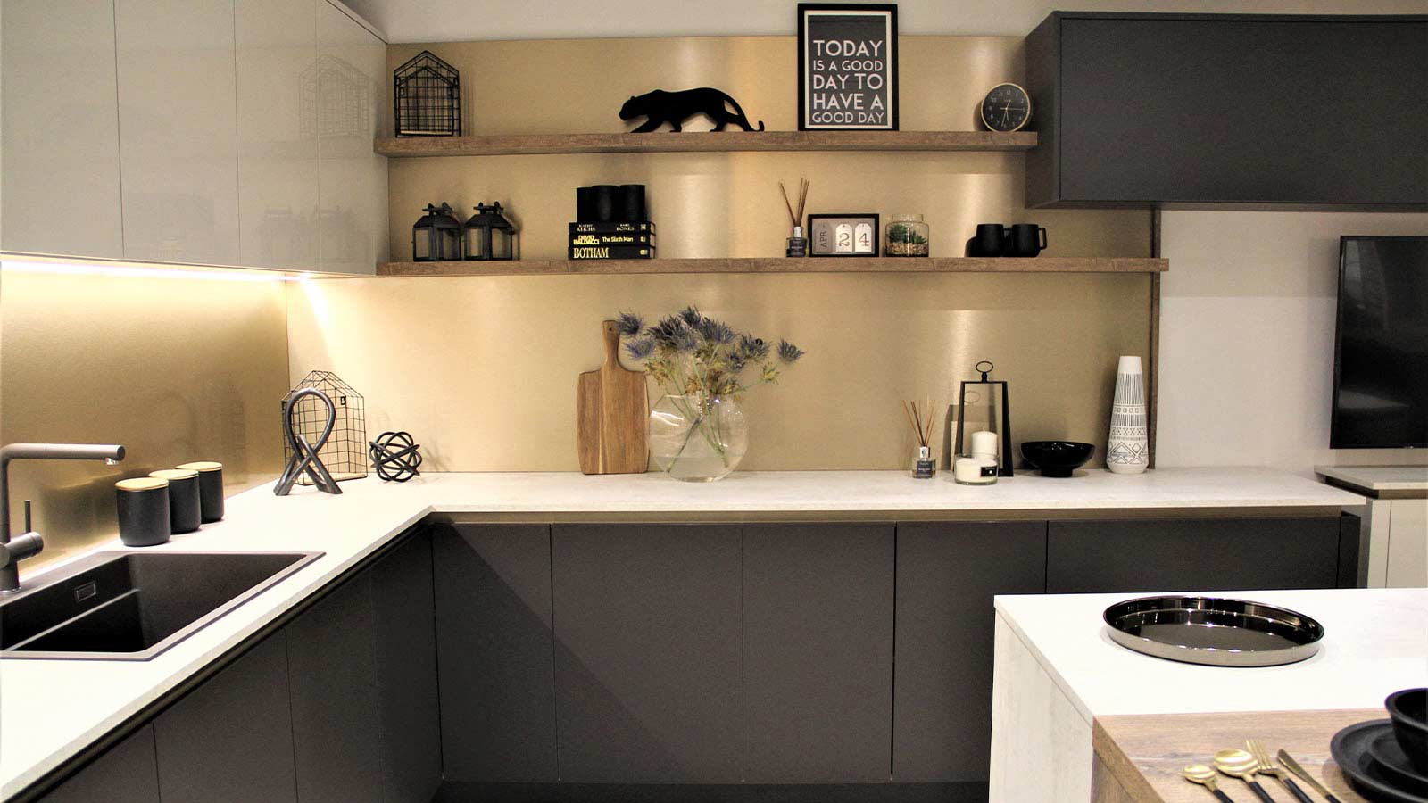 Bronze metallic splashback in a modern luxury kitchen