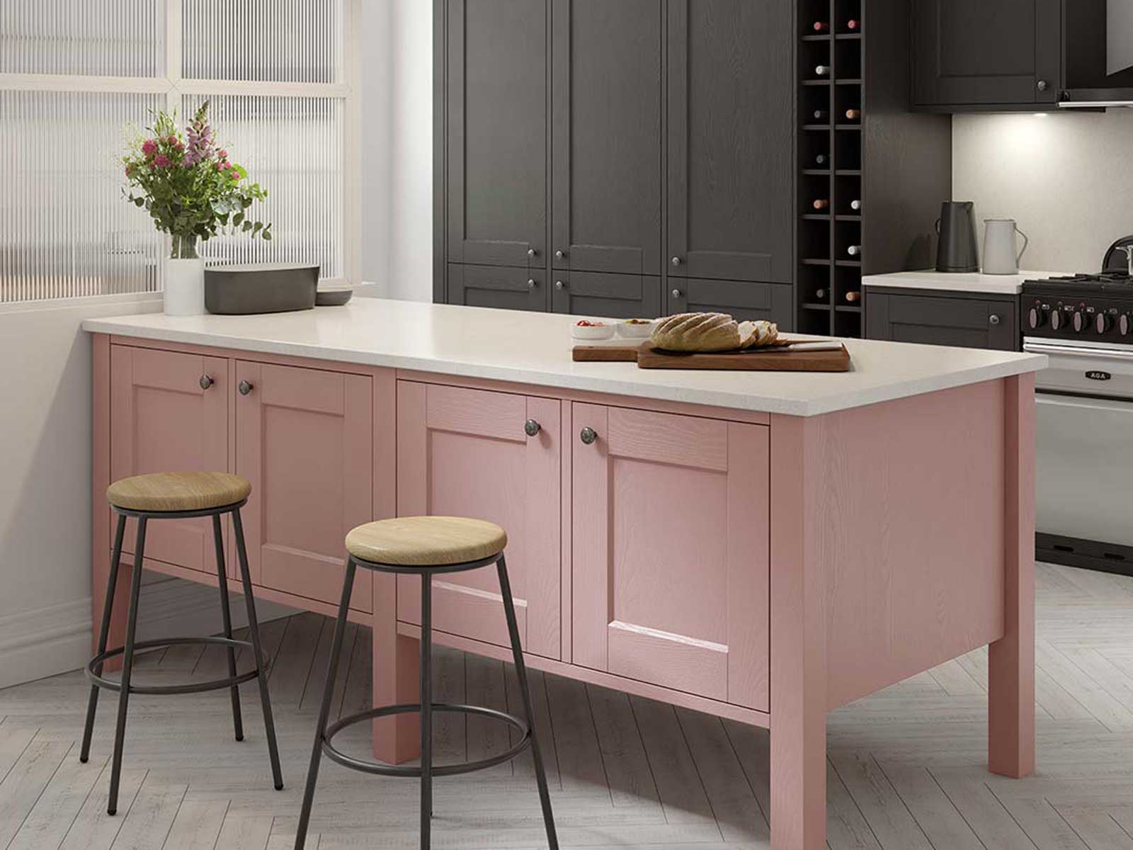 A Vintage Rose Solva kitchen island with Portland oak barstools