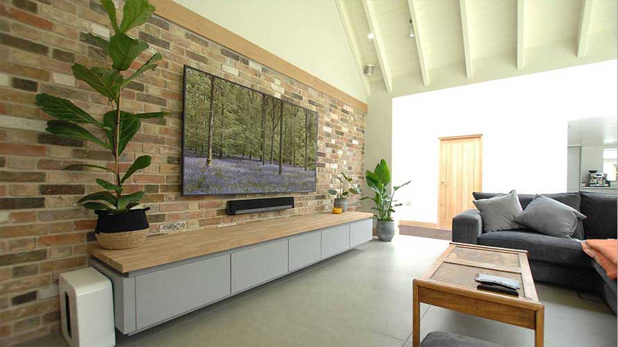 A modern entertainment center in an open plan space