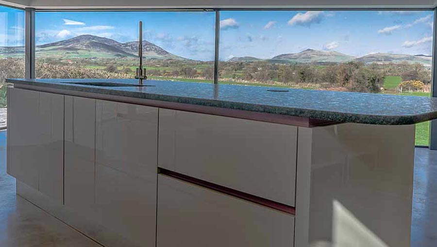 Handleless kitchen island in a modern farmhouse kitchen