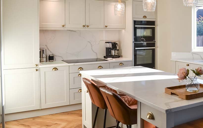 Small kitchen island in a grey shaker kitchen