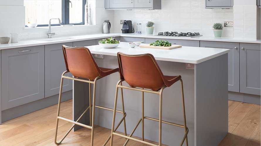 Small kitchen island in a grey shaker kitchen