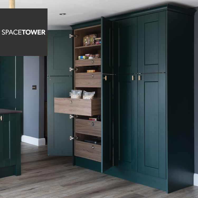 Pull-out larder unit with drawers in dark green kitchen